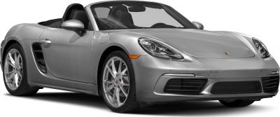 Front-side view of a silver convertible with sharp headlights and alloy wheels