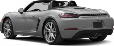 Rear side view of a convertible with alloy wheels and side air intake