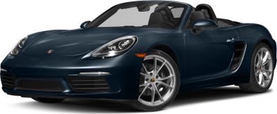 Convertible sports car front with sleek headlights and alloy wheels