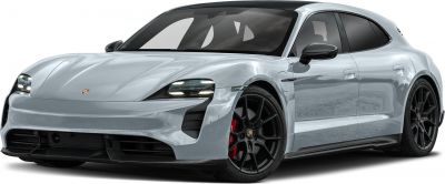 Front view of a sleek electric vehicle with LED headlights and sporty black alloy wheels with red brake calipers