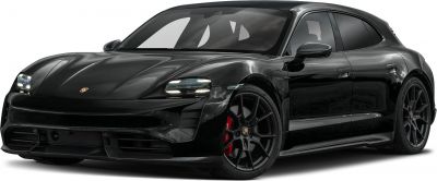 Black electric hatchback with aerodynamic front and advanced headlights
