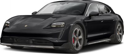 Front view with LED headlights and aerodynamic design of a black electric sports crossover