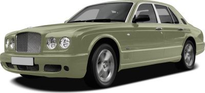 Luxury sedan with classic round headlights and mesh grille, front and side view.