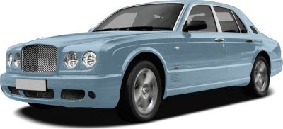 Front three-quarter view of blue luxury sedan with prominent grille and round headlights