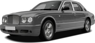 Luxury sedan front side showcasing mesh grille and quad round headlights.