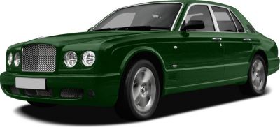 Luxury sedan with mesh grille and quad round headlights
