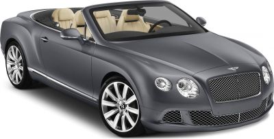 Front view of luxury convertible with chrome grille and beige leather interior