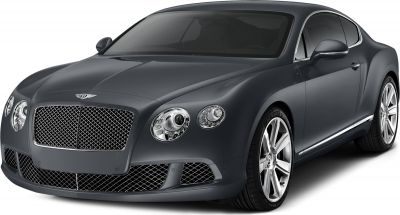 Front view of luxury coupe with mesh grille and round headlights