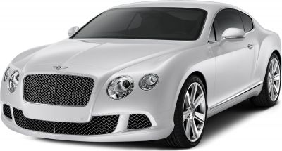 Front view of luxury coupe with mesh grille and round headlights