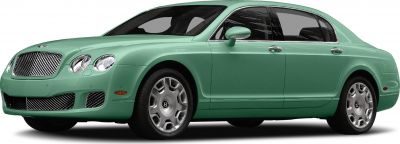 Luxury sedan with chrome grille and dual round headlights