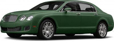 Green luxury sedan with chrome mesh grille and dual round headlights