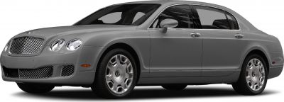 Front side view of luxury sedan with mesh grille and round headlights