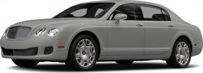 Luxury sedan with mesh front grille, quad circular headlights, alloy wheels