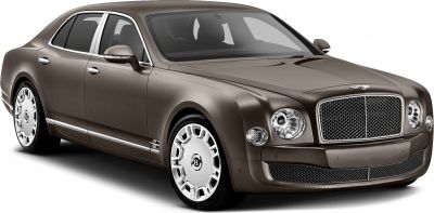 Luxury sedan with round headlights and chrome mesh grille