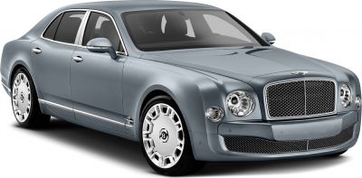 Luxury sedan with rounded headlights, mesh grille, and unique alloy wheels