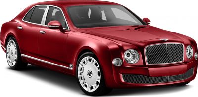Front view of luxury sedan featuring iconic Bentley grille, round headlights, and polished alloy wheels.