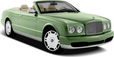Green luxury convertible with beige interior and classic front grille