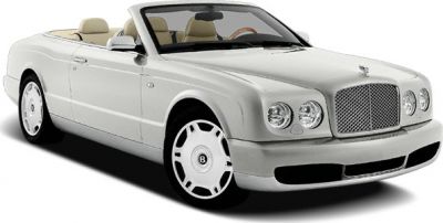 White luxury convertible with prominent front grille and dual headlamps