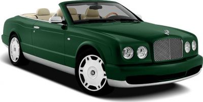 Luxury convertible with round headlamps and signature grille