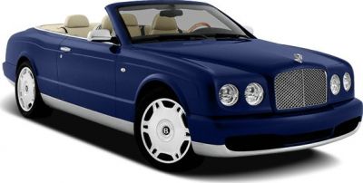 Blue convertible with beige interior and dual round headlights