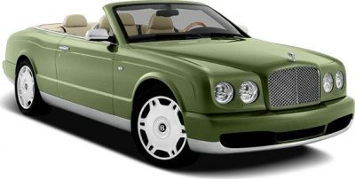 Luxury convertible with dual round headlights and prominent grille
