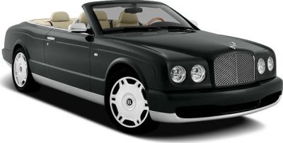 Convertible luxury car with beige leather interior and classic front grille