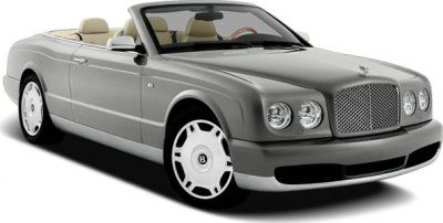Elegant convertible car front view with beige interior and distinctive grille