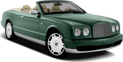 Convertible luxury sedan with green body and plush interior seats