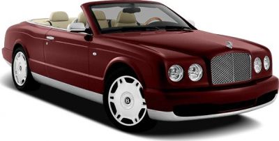 Luxury convertible with maroon body and beige interior