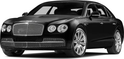Front view of luxury sedan showcasing mesh grille and round dual headlights