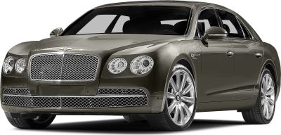 Luxury sedan front with mesh grille and quad round headlights