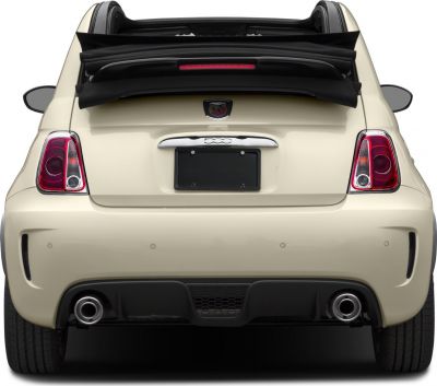 Rear view with retractable soft top and dual exhaust pipes