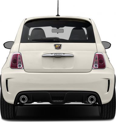 Rear hatchback view with dual exhaust and tinted rear window