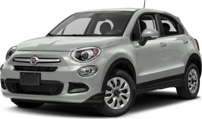 Front side view of compact SUV with rounded headlights and distinctive grille