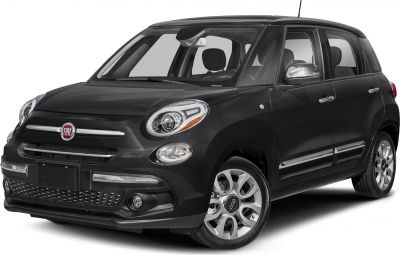 Front three-quarter view with rounded headlights and chrome trim