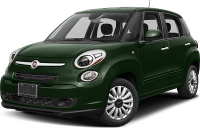 Compact four-door hatchback with round headlights and alloy wheels