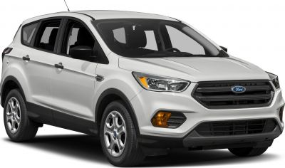 Front 3-4 view of an SUV with distinctive headlights and grille.