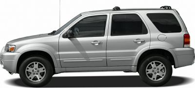 Side profile of silver mid-size SUV with roof rails and alloy wheels