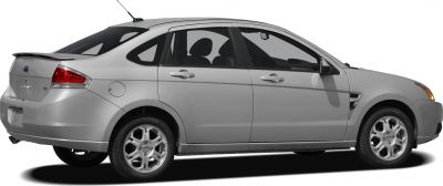 Side profile of sedan with alloy wheels and rear spoiler