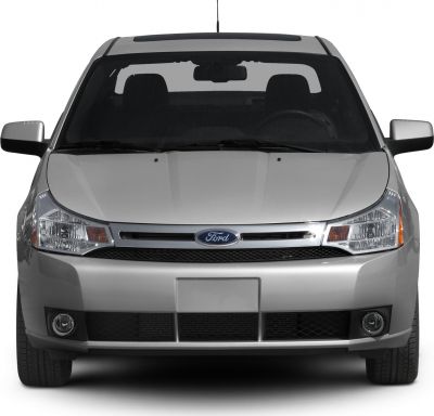 Front view of sedan with chrome grille, headlamps, fog lights