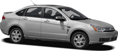 Side profile of a silver sedan with alloy wheels and rear spoiler