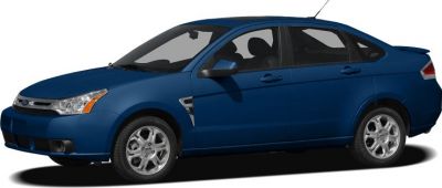 Side profile of a dark blue mid-2000s sedan with distinctive design lines and alloy wheels