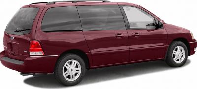 Side view of a 2004 minivan with sliding rear doors and alloy wheels