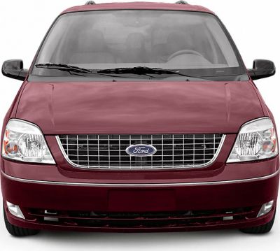 Front view with grille and headlights of a minivan