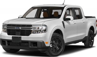 Front grille and side view of a white pickup truck with black wheels