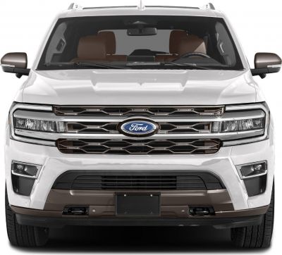 Front grille and headlights of a large SUV with a bold front fascia.