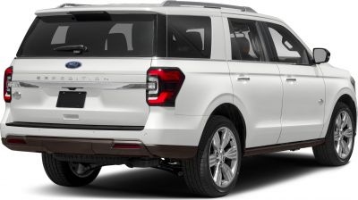 Rear view and tail lights of a large SUV with roof rails