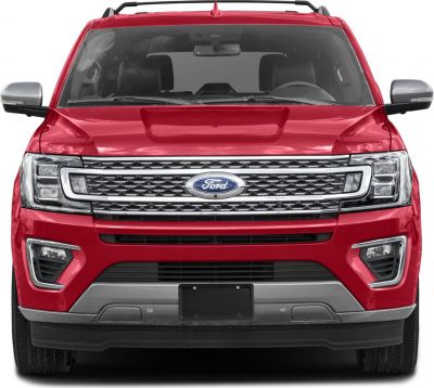 Front grille, headlights, and bumper of a large SUV front view.