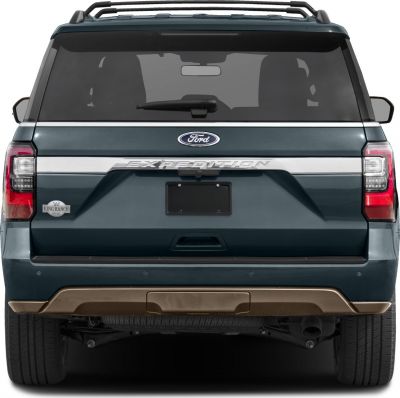 Rear view of SUV with distinct taillights, rear wiper, and King Ranch badge