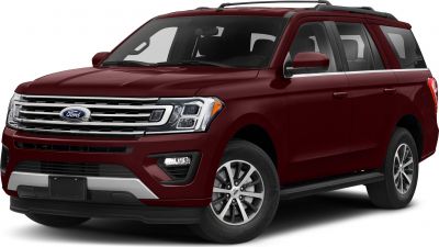 Bold front grille and distinctive headlight design of a large SUV